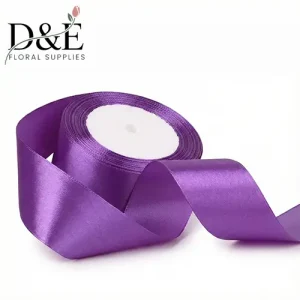 Purple 1.5 inch single face satin ribbon roll on white background