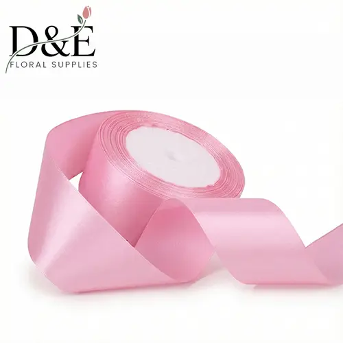 SR-07-pink Pink 1.5 inch single face satin ribbon roll on white background