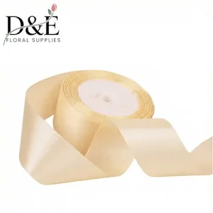 Beige 1.5 inch single face satin ribbon roll on white background